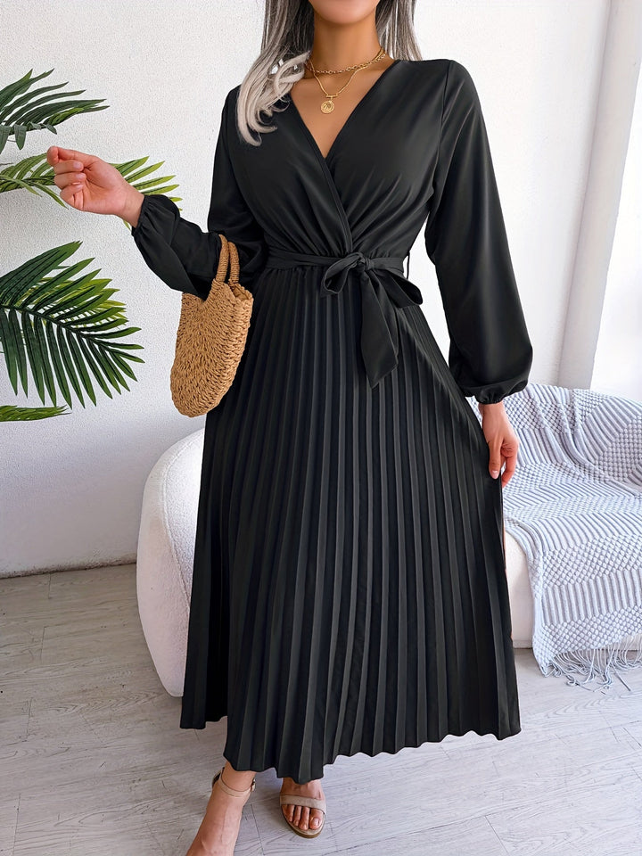 Camille - Elegant pleated dress with long sleeves and crossover neckline
